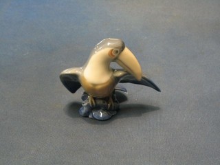 A Royal Copenhagen porcelain figure of a Toucan with wings outstretched, base marked Denmark 2574 4"