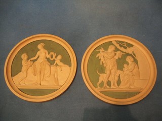 A pair of 19th Century Continental circular terracotta plaques depicting classical scenes, the reverse impressed P.Apsen Kjobenhave 9" (1 with 2 small chips to rim)