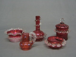 A 19th Century cranberry glass vase 6", 2 cranberry glass dishes 5", a circular wavy cranberry glass dish 5" and a small cranberry glass jug with clear handle 4"