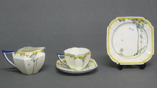 A 20 piece Shelley pottery tea service comprising cream jug (cracked), sugar bowl, twin handled bread plate, 6, 7 1/2" tea plates (1 crazed), 5 saucers (1 cracked), 6 tea cups (1 cracked), the base marked Shelley 11624X RD 723404