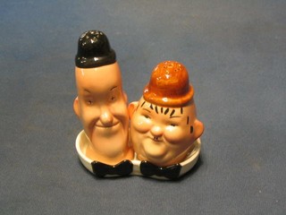 A Beswick 2 piece condiment set in the form of Laurel & Hardy  (Oliver with slight chip)