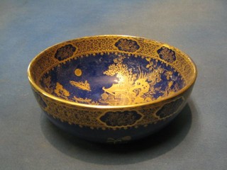 A circular blue glazed Carltonware Willow pattern bowl, 8"