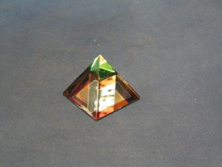 A glass pyramid shaped prism set a first class stamp, cased