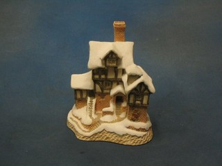 A 1987 David Winter Christmas cottage "Ebinezer Scrooge's Country House"
