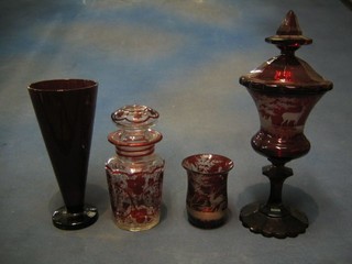 A 19th Century Bohemian glass jar and cover 12" (f and r), a Bohemian glass pickle jar and cover 7", a small do. vase 4" and a ruby glass waisted beaker 8"