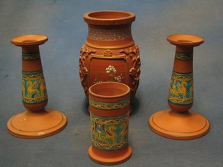 A 19th Century Oriental tan ware vase the base with seal mark 7" (cracked) together with a pair of 19th Century terracotta candlesticks (1 chipped) and a cylindrical vase
