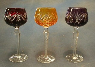 6 coloured glass long stemmed hock glasses