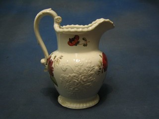 A Victorian pottery jug with floral decoration 12" (handle f and cracked)