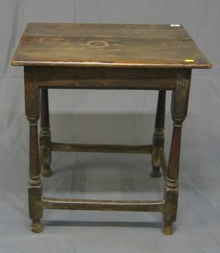 A rectangular Antique oak table of joyned construction  raised on turned and block supports 22"