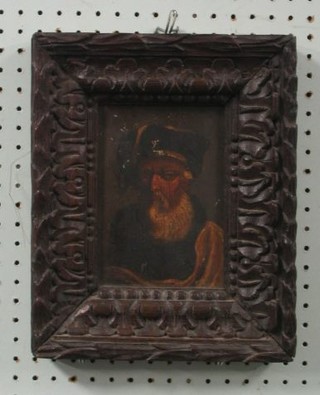An 18th/19th Century Continental oil painting on board "Bearded Gentleman" 7" x 5" contained in a carved frame