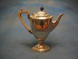 A Georgian style silver plated coffee pot of demi-reeded form