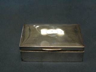An Art Deco rectangular silver cigarette box with hinged lid Birmingham 1929, 5"