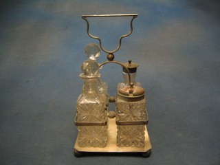 A silver plated 4 bottle cruet set with 4 cut glass bottles