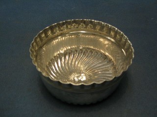 A circular Victorian embossed silver sugar bowl, London 1895 2 ozs