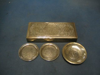 An engraved Persian silver box with hinged lid 8", 2 circular Persian silver dishes 3" and an ashtray set a coin, 16 ozs