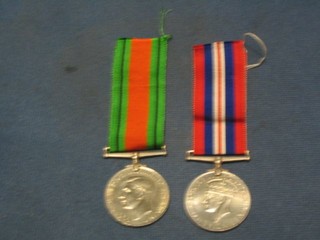 A pair British War medal and Defence medal, in original box of issue