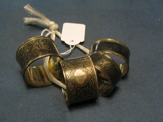 A pair of Siamese Sterling silver napkin rings with niello decoration and 1 other pair