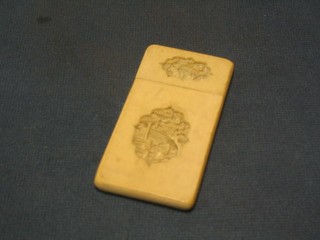 A 19th Century carved ivory card case 3"