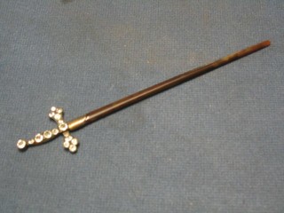 A 19th/20th Century tortoiseshell firing sword, the hilt set brilliants 6"