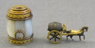 A miniature gilt metal and mother of pearl 2 drawer binocular and a gilt metal and silver model of a horse and barrel cart