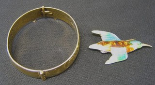 A gold plated bracelet and an enamelled Kingfisher brooch