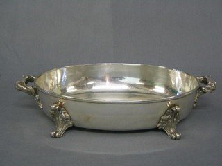 A silver plated twin handled dish 12"