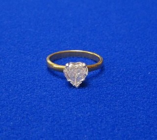 A lady's 18ct gold engagement/dress ring set a heart cut diamond (approx 1.75 carat)
