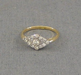 A lady's diamond shaped dress ring set 13 diamonds (approx 0.36ct)