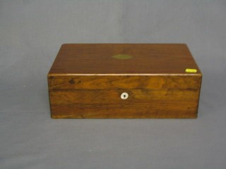 A Victorian walnut writing slope with hinged lid 14"