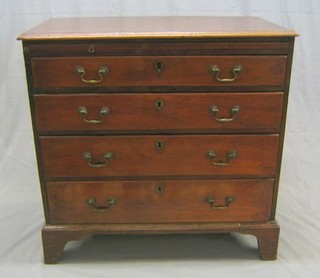 A Georgian mahogany chest with brushing slide and 4 long drawers, raised on bracket feet 34"