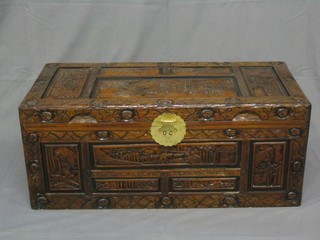 A Hong Kong carved camphor wood coffer with hinged lid 35"