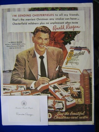 A Ronald Regan signed compliment slip, President Ronald Regan, 3" x 4" together with an advertising poster for Chesterfield Cigarettes