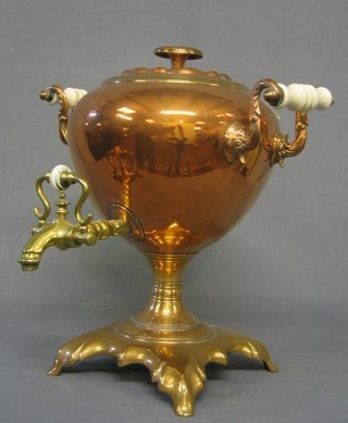 A copper and brass Samovar with ceramic handles