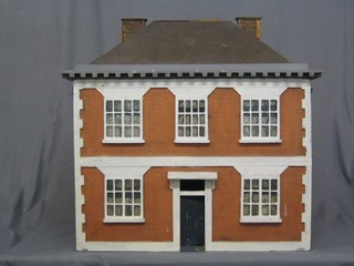 A large Victorian double sided dolls house