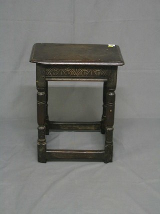 An Antique carved oak joyned stool raised on turned and block supports 18" (one stretcher slight f and r)