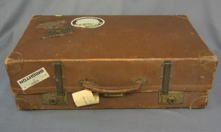 A 1930's suitcase with 2 Southern Railways Brighton labels and other labels