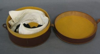 An old circular leather collar box