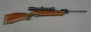 A German Feinwerkbau-Sport 172 air rifle with telescopic sights