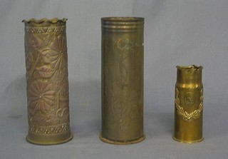 A WWI Continental Trench Art shell case embossed St Quentin and 2 other Trench Art shell cases