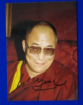 A signed colour photograph of the Dalai Lama