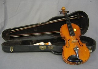 A childs violin by Karl Bitterer, dated 1931 with 2 piece back 14", together with 2 bows cased
