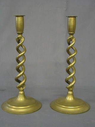 A pair of brass spiral turned candlesticks 12"