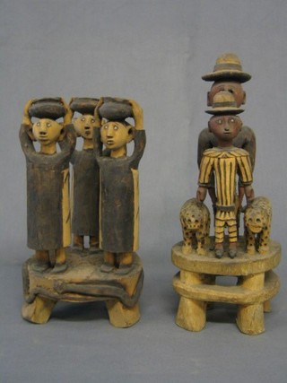 2 19th Century African carved wooden figures of leopard and standing natives with pots 12"