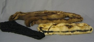A mink stole, an African collar and 2 mink ties contained in a Martin & Snellgrove box