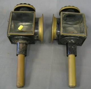 A pair of 19th Century brass and Japanned coaching lamps