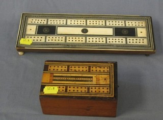 An Eastern ivory and ebony cribbage board and 1 other