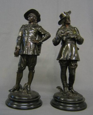 A pair of Victorian spelter figures of standing Cavaliers 17"