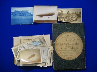 Cary, a reproduction of his long map of England and Wales and part of Scotland, cased, together with a collection of WWI photographs of air ships, boats etc