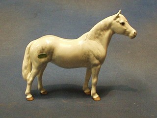 A Beswick figure of a standing Connemara horse