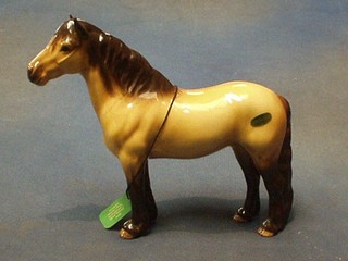 A Beswick figure of a standing Highland horse Champion Machion-Neach